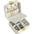 Mini travel jewelry case in beige, open with mirror