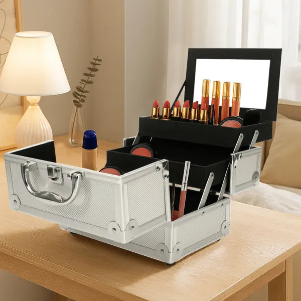 Aluminum makeup train case open with trays and mirror